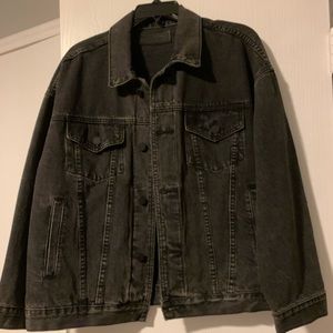 Jeans jacket . black fade color.over medium size.